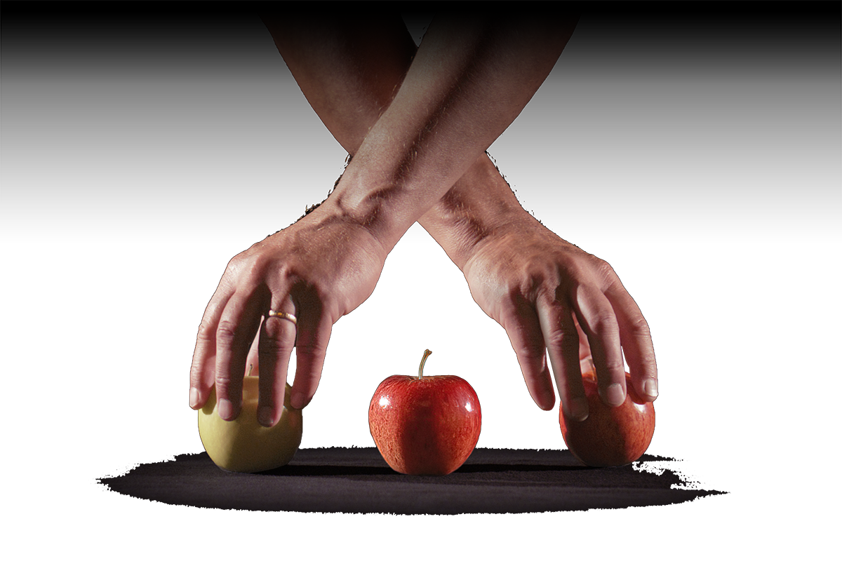 Skyfflande händer med äpplen